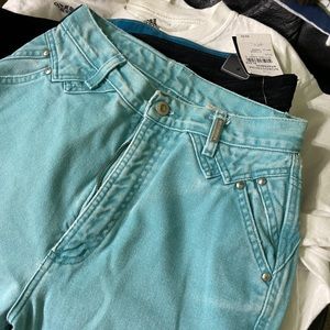 1990s light faded teal Rockies denim jeans